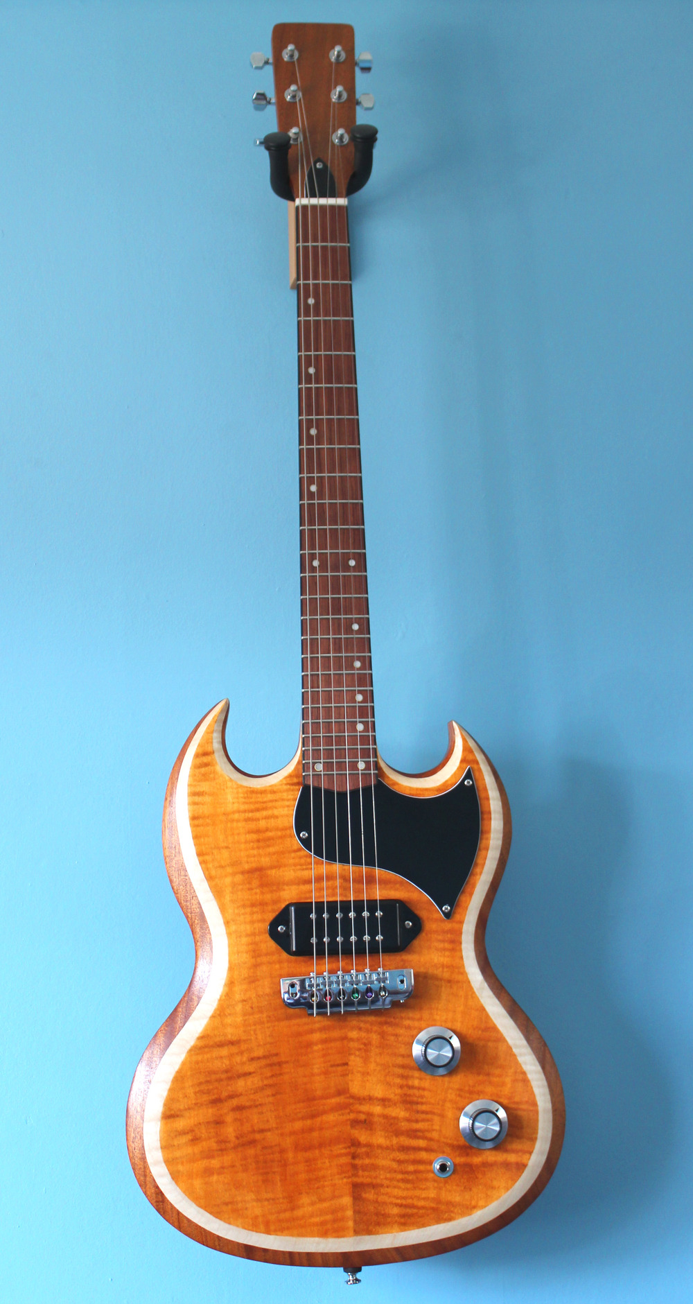 Guitar resembling a SG Junior with a humbucker